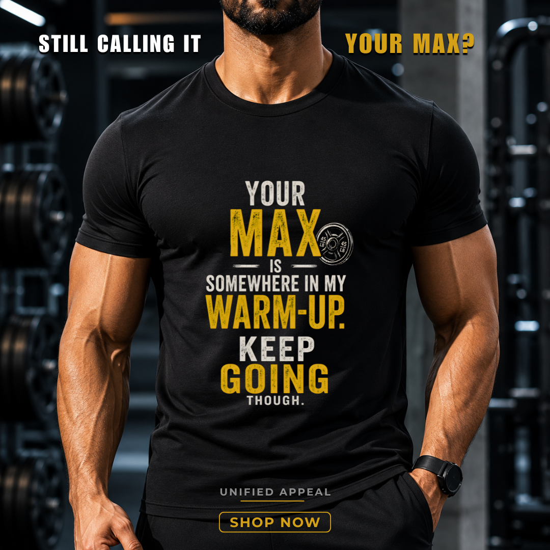 Person wearing a black t-shirt with motivational text in a gym setting