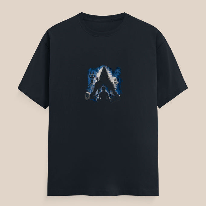 Black t-shirt with a blue mahadev silhouette graphic design and a trident on a white and blue background and a man sitting in front of him