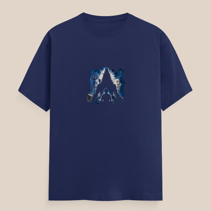 Black t-shirt with a blue mahadev silhouette graphic design and a trident on a white and blue background and a man sitting in front of him
