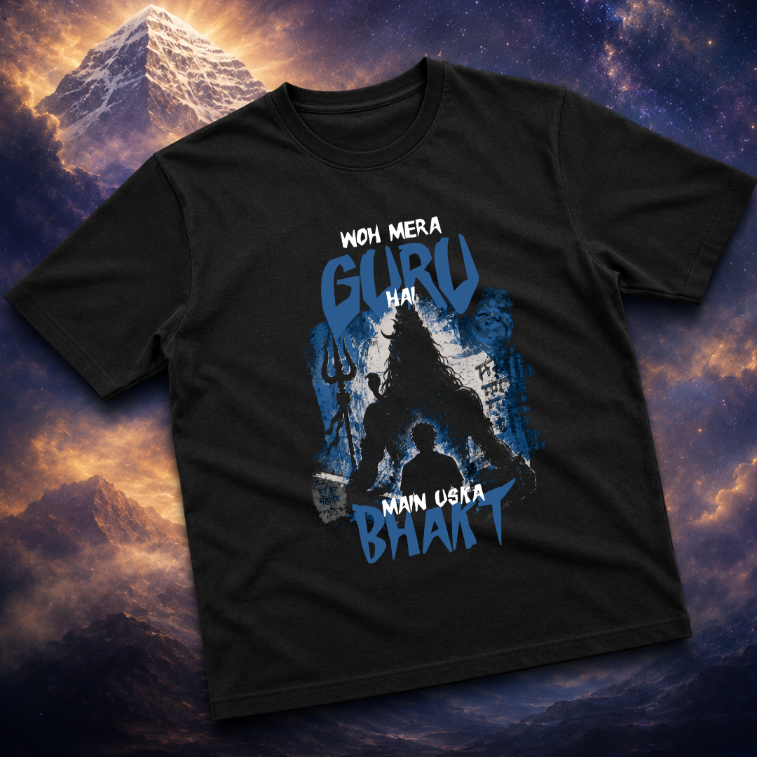 Black t-shirt with graphic design and text against a mountain and sky background