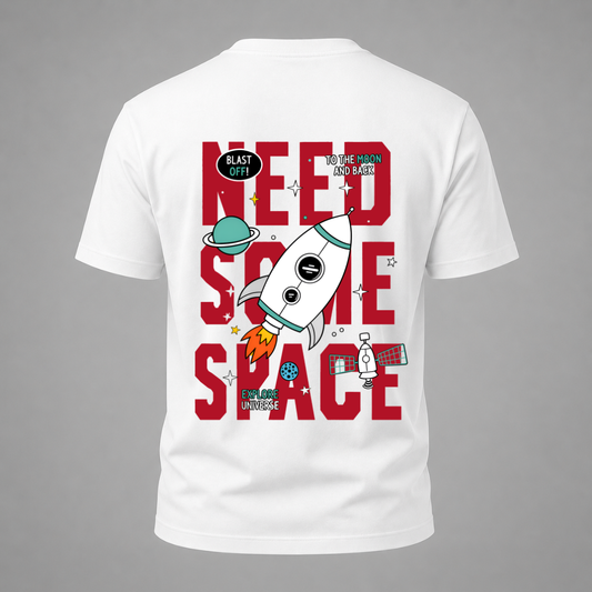 White t-shirt with space-themed graphic and text on a gray background