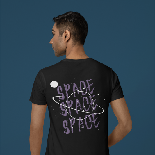 Person wearing a black t-shirt with 'SPACE' text on the back against a blue background