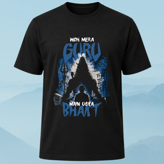 Black t-shirt with blue mahadev silhouette graphic design and text on a light blue background with a man sitting in front of him